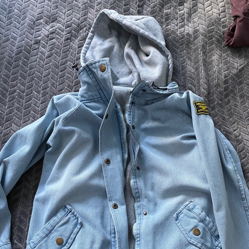 Jean jacket with grey fleece under liner with hood